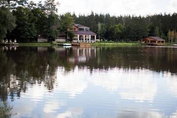 Фото номера Дом с 2 спальнями Дома для отпуска Cottages Charivne ozero г. Korostyshiv 50